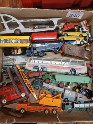 a box full of toy cars and trucks in it