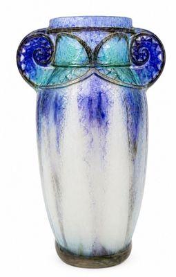 a blue and white vase with a blue and white design on it
