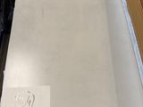 a stack of boxes and boxes of paper on the floor