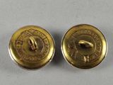 two brass buttons with the words, the united states, and the emblem of the united states