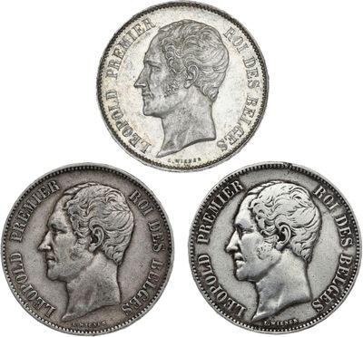 three silver coins of the british empire