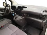 the interior of a car with a steering wheel and dashboard controls