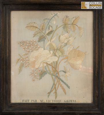 une photo d'un tableau représentant des fleurs, dans un cadre