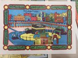 a picture of a postcard with a picture of a city