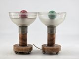 two lamps that are sitting on top of each other