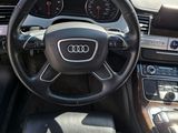 dashboard of a car with a steering wheel and dashboard gauges