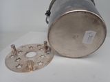 a metal container with a star design on it
