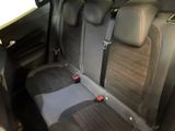 a car that has two seats in the back of it