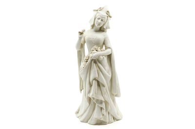 a statue of a woman with a flower in her hand