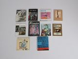 a lot of books that are on the table