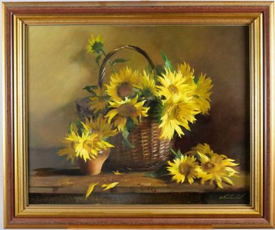 painting of sunflowers in a wicker basket on a table