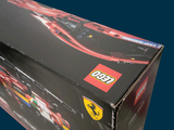 a black box with a red car inside of it