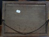 a wooden box with a piece of paper on top of it
