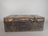 an old trunk that is sitting on a table