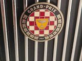 an image of a close up of a car grill with a badge on it