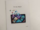 a picture of a book with a picture of a cell phone on it