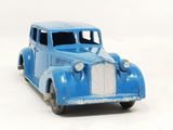 a blue toy car that is sitting on a white surface