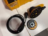 a yellow box with a black cord and a yellow shower headphone