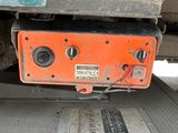 a close up of a truck with a red and white stripe