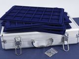 several pieces of luggage are stacked on top of each other on a table