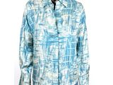 the shirt is blue and white with a pattern on it
