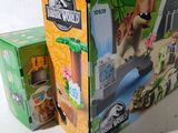 a box that has a toy in it and a box with a toy in it