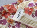 a close up of a dress with a label on it