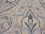 a close up of a rug with a pattern on it