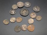 some old coins are arranged in a circle on a table