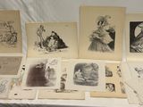 une photo montrant un tas de dessins et d'images posés sur une table
