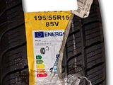 a close up of a tire on a white background with a tag on it
