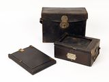 a small box and a small box on a white surface