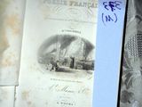 an old book with a picture of a ship on it