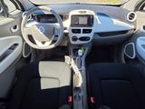 a picture of a car with a steering wheel and dashboard