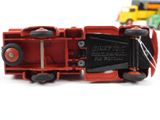 a toy train that is sitting on a white surface