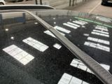 a car that is parked on the side of the street