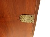a wooden door with a metal latch on it