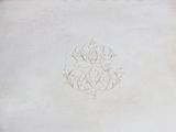 a silver tray with a monogram on it