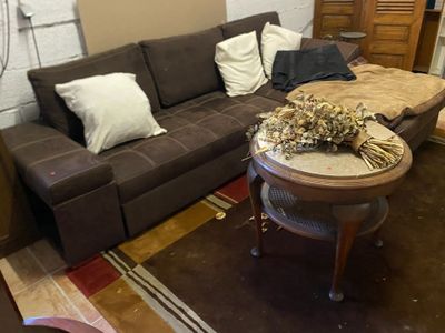 a living room with a couch and a coffee table