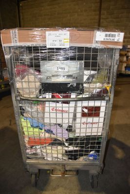 a cart with a lot of items in it in a warehouse