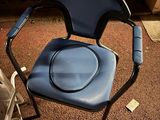 a blue chair that is sitting on the floor