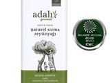 an image of a can of olive oil with a label on it