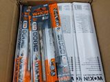 a cardboard box with a bunch of tools inside of it