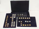 an image of a case with a lot of coins inside of it