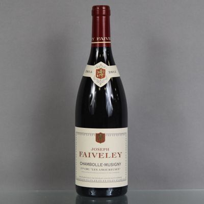 a bottle of wine that is sitting on a table