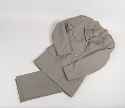 an image of a suit and pants on a white surface