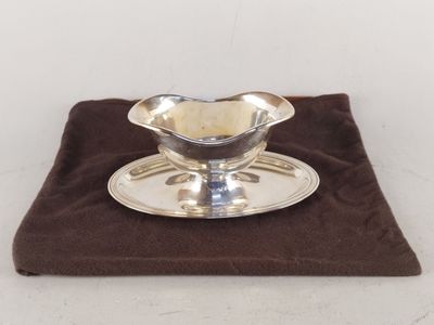 CHRISTOFLE.Saucière casque à dormant fixe en métal argenté,. - Photo 1