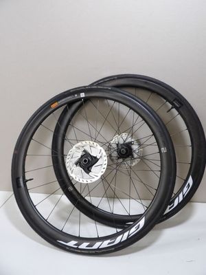 the wheels are black and white with white lettering on them