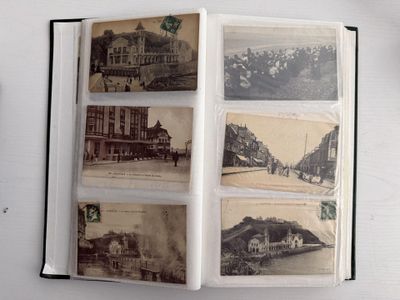 un livre ouvert, dans lequel on peut voir de vieilles photos d'une ville