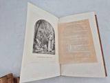 an open book with a picture of a man and a woman on it